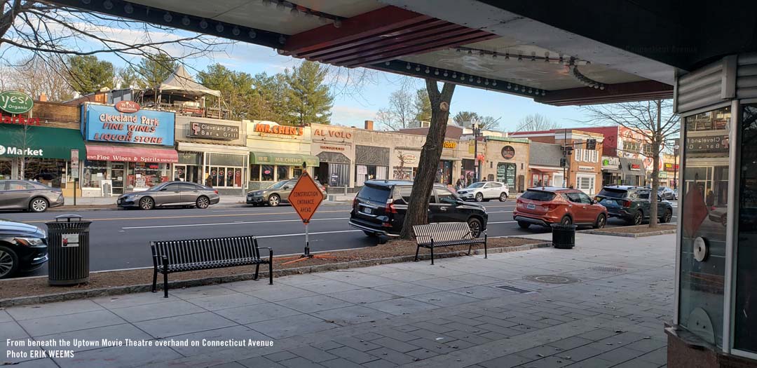Beneath the Uptown Movie Theater overhang looking out at Connecticut Avenue in Cleveland Park area Beneath the Uptown Movie Theater overhang looking out at Connecticut Avenue in Cleveland Park area
