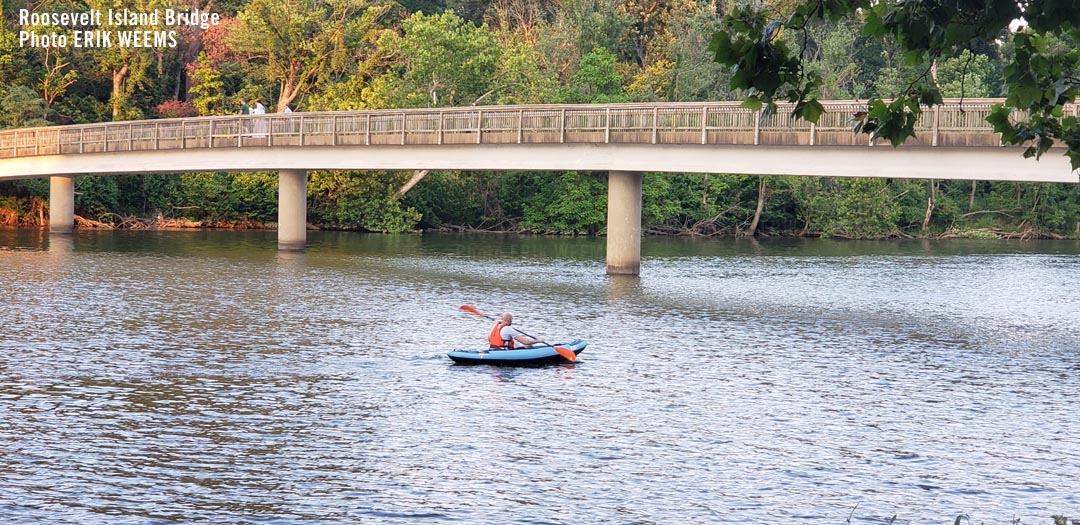 Canoe Paddling under the bridge at Roosevelt Island Canoe Paddling under the bridge at Roosevelt Island