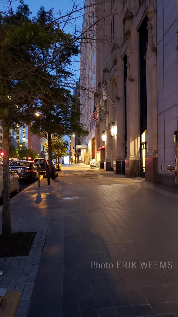 at night on sidewalk at Farragut Park and 17th street side
